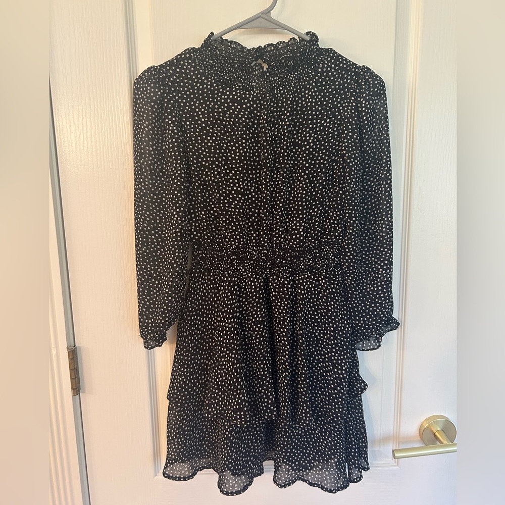 Girls size 10 black dress with small white polka dots
